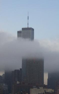 Storm clouds below the towers